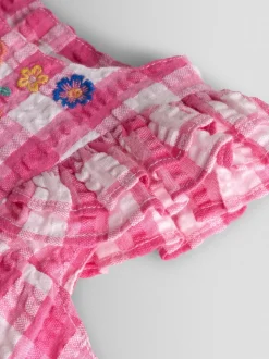 Barboteuse JoJo Maman Bébé brodée à épaules volantées