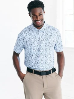 Blanc - Polo de golf à imprimé géométrique actif