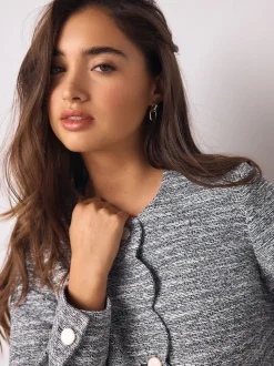 Bleu - Veste bouclée sans col festonné