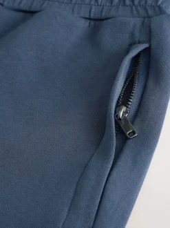 Bleu acier - Pantalon de jogging slim en modal doux à poignets Signature