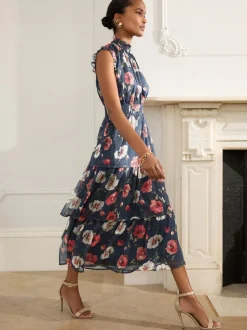Bleu marine à fleurs - Robe longue imprimée à col haut et à volants