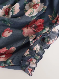 Bleu marine à fleurs - Robe longue imprimée à col haut et à volants