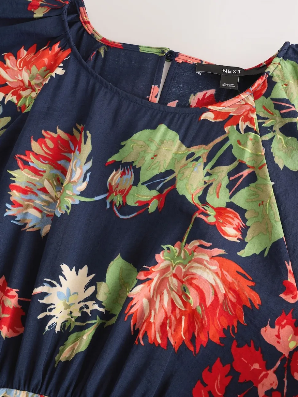 Bleu marine à fleurs - Robe mi-longue imprimée à manches bouffantes