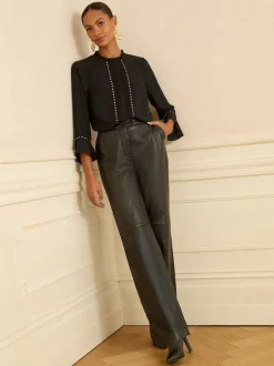 Coeur noir - Love & Roses chemisier à manches flûte avec détail matériel