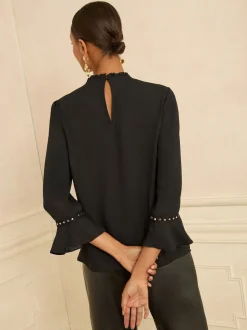 Coeur noir - Love & Roses chemisier à manches flûte avec détail matériel