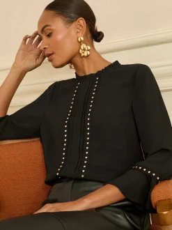 Coeur noir - Love & Roses chemisier à manches flûte avec détail matériel