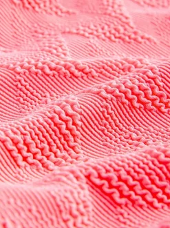 Corail rose fluo texturé - Maillot de bain gainant à encolure dégagée