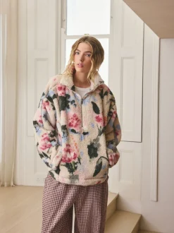 Crème fleuri - Polaire en imitation peau de mouton à col zippé