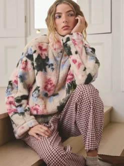 Crème fleuri - Polaire en imitation peau de mouton à col zippé