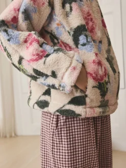 Crème fleuri - Polaire en imitation peau de mouton à col zippé