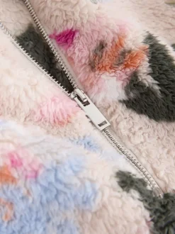 Crème fleuri - Polaire en imitation peau de mouton à col zippé