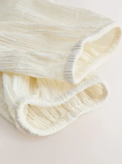 écru - Chemisier texturé à col bateau et manches longues