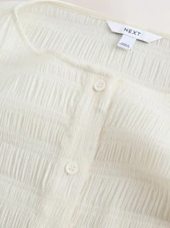 écru - Chemisier texturé à col bateau et manches longues