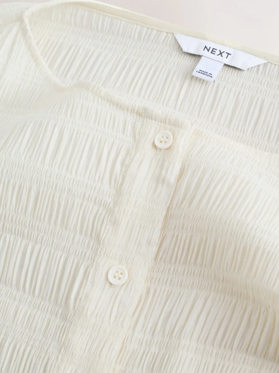 écru - Chemisier texturé à col bateau et manches longues