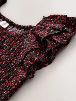 Ditsy noir - Robe smockée à manches volantées (3-16ans)