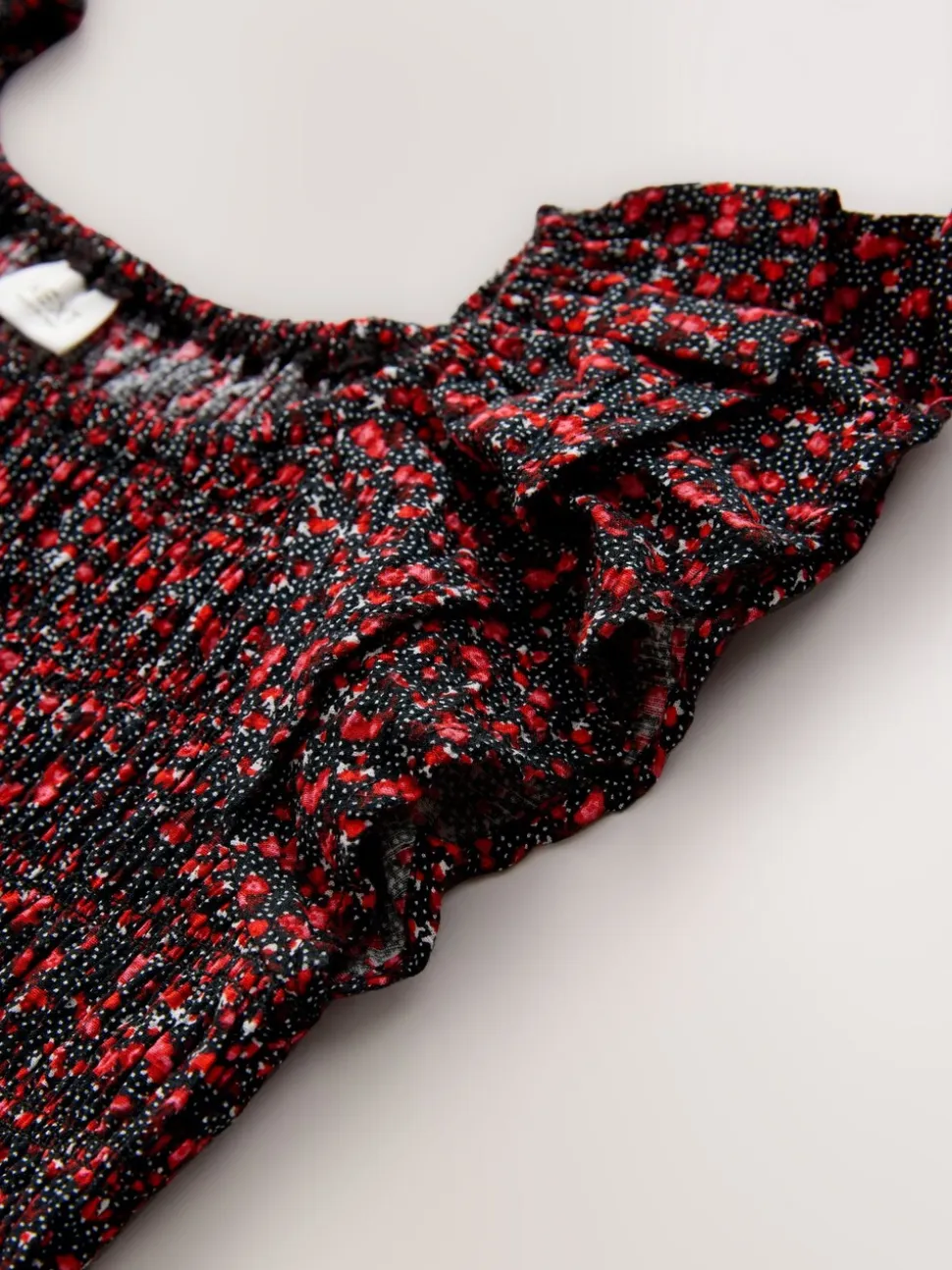 Ditsy noir - Robe smockée à manches volantées (3-16ans)