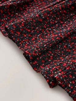 Ditsy noir - Robe smockée à manches volantées (3-16ans)