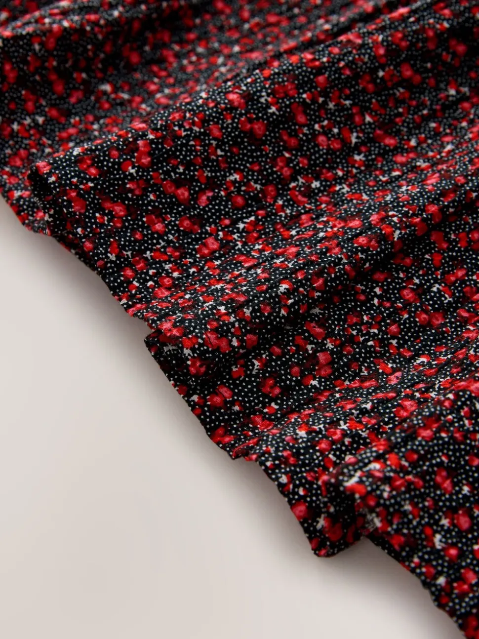 Ditsy noir - Robe smockée à manches volantées (3-16ans)