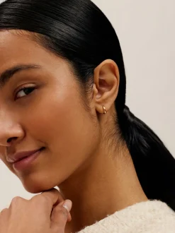 Dorée - Ted Baker - Boucles d'oreilles avec logo Tone Crisete