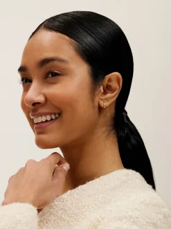 Dorée - Ted Baker - Boucles d'oreilles avec logo Tone Crisete