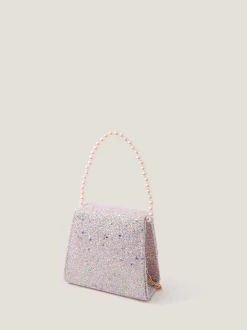 Ensemble Monsoon sac à paillettes avec nœud et pinces à cheveux