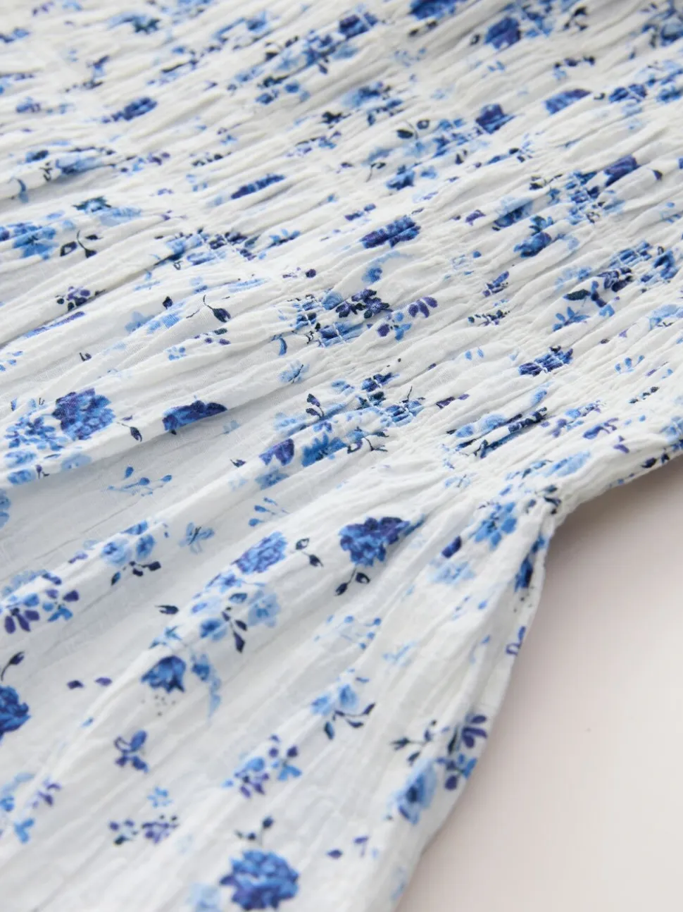 Floral bleu - Robe smockée à manches volantées (3-16ans)