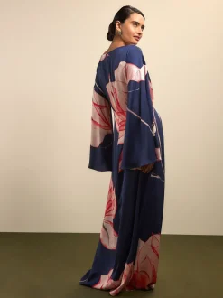 Floral de marine - Robe longue en satin à manches longues torsadée sur le devant