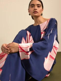 Floral de marine - Robe longue en satin à manches longues torsadée sur le devant