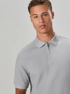 Gris - Polo texturé élégant à col zippé