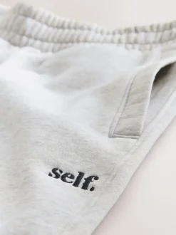 Gris - soi-même. Pantalon de jogging coupe large