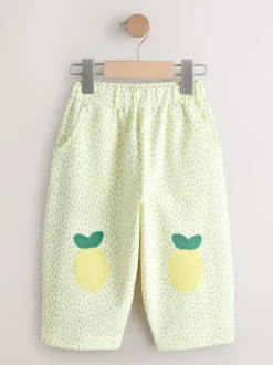 Jaune motif citrons - Pantalons avec ornements style tonneau (3mois-7ans)