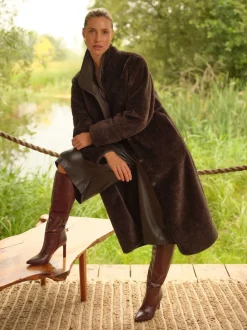 Manteau Love & Roses mi-long en shearling à liserés