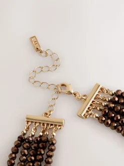 Marron chocolat - Collier plat à facettes avec gradins de perles graduées