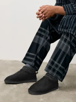 Noir - Chaussons bottines en maille à poignets