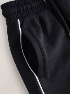 Noir - Ensemble polo et short à col zippé (3-16 ans)