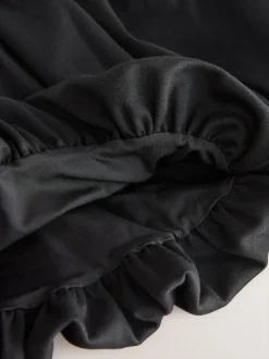 Noir - Jupe à enfiler en jersey extensible à ourlet boule (3-17ans)