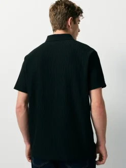 Noir - Polo texturé élégant à col zippé