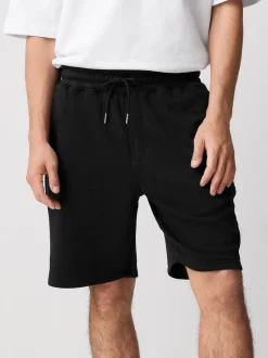 Noir - Short à poche zippée en jersey brossé