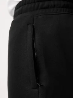 Noir - Short à poche zippée en jersey brossé
