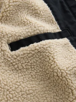 Noir - Veste à capuche en toile doublée de borg