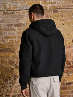 Noir - Veste à capuche en toile doublée de borg