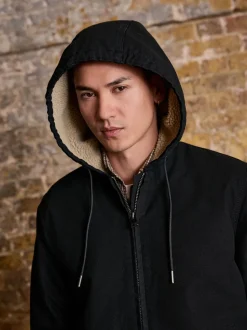 Noir - Veste à capuche en toile doublée de borg