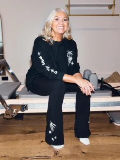 Noir brodé - Leggings évasés en coton Never Fully Dressed