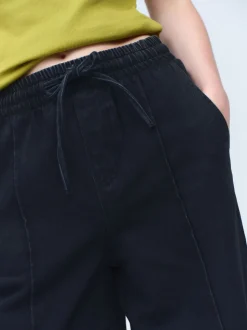 Noir lavé - Jogging en jean large à plis nervurés