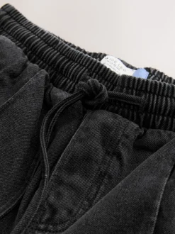 Noir lavé - Jogging en jean large à plis nervurés