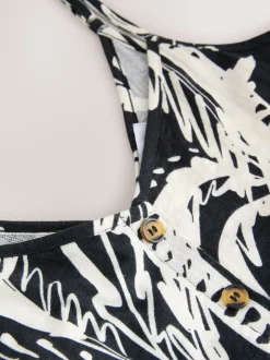 Noir/blanc imprimé palmiers - Robe mi-longue boutonnée en jersey