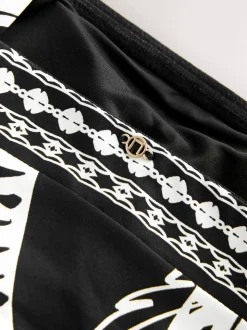 Noir/Crème Palmier - Maillot de bain Bandeau gainant à jambes froncées