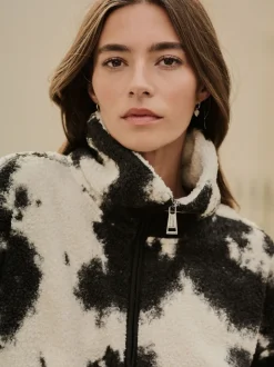 Noir/écru imprimé vache - Polaire douce en polaire en peau de mouton à col zippé