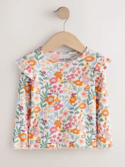 Orange à petites fleurs - Haut côtelé à volants et manches longues (3mois à7ans)