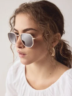 os - Lunettes de soleil rondes en métal